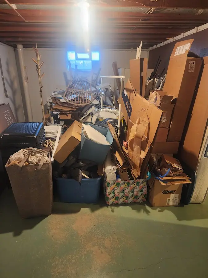 Roll-off dumpster container at job site for 20 Yard Dumpster Rental in Central Gardens